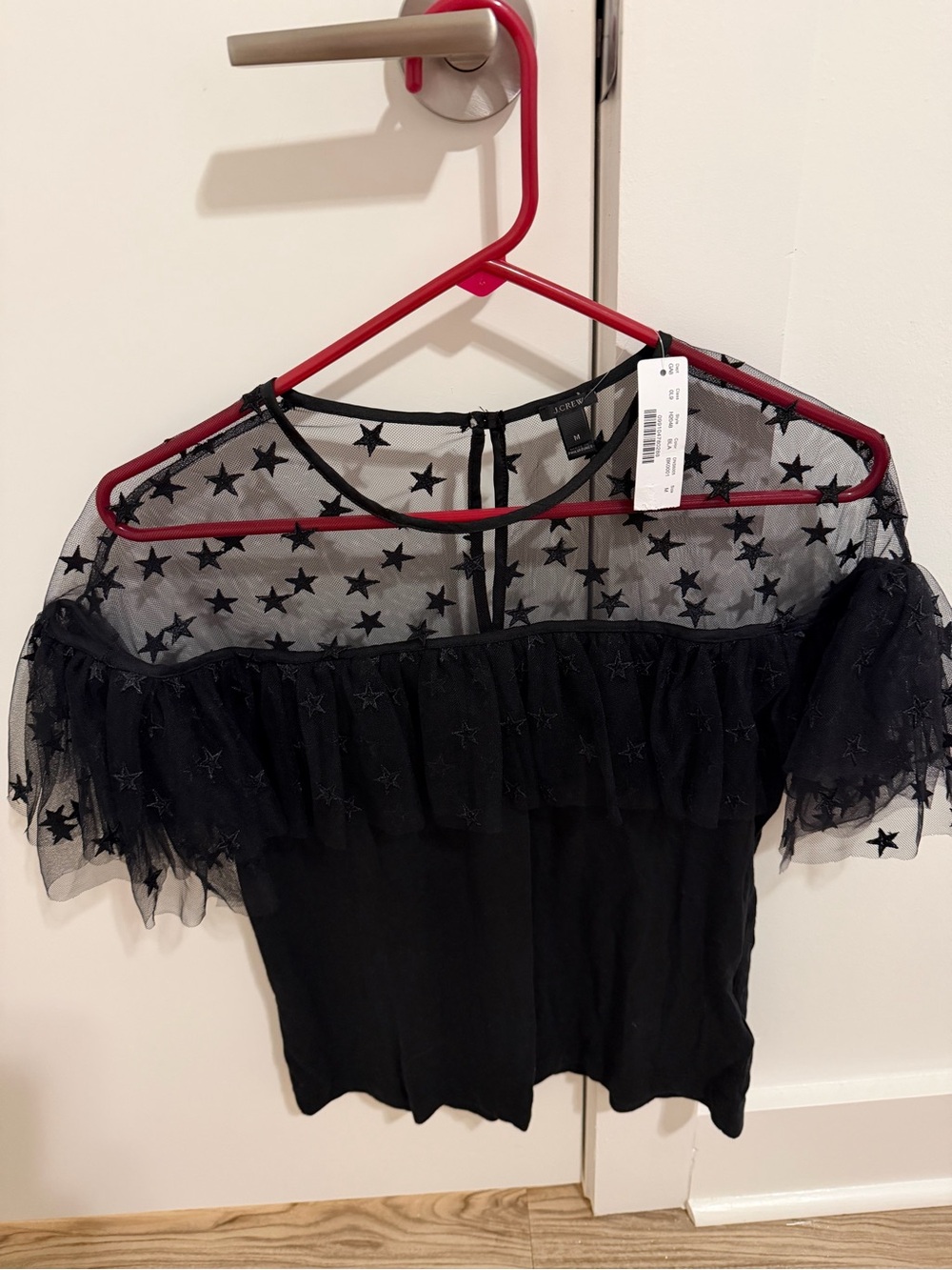 New J.Crew Black Star Mesh Ruffle Off-Shoulder Top, size Medium.